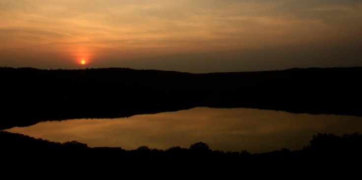 Lonar lake during sunset by Adityavikram More
